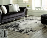Zekeman Black/Cream/Gray Medium Rug by Ashley at Eve Furniture
