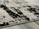 Zekeman Black/Cream/Gray Medium Rug by Ashley at Eve Furniture