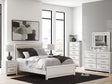 Zuraleus White Upholstered Panel Bedroom Set by Ashley at Eve Furniture