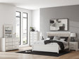 Zuraleus White Upholstered Platform Bedroom Set by Ashley at Eve Furniture